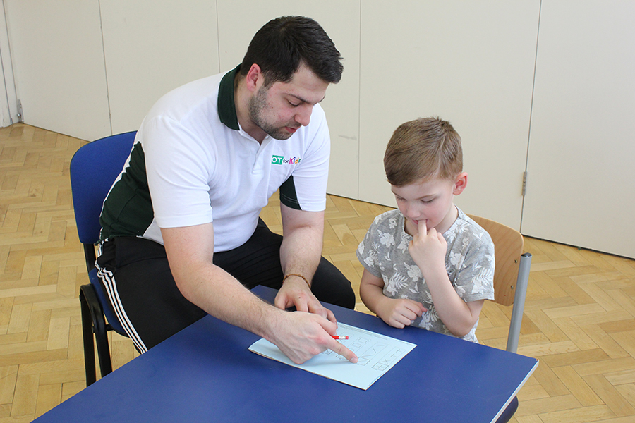 Child completing an initial assessment with therapist